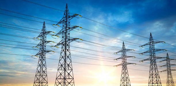 Electrical poles of high voltage in blue sky